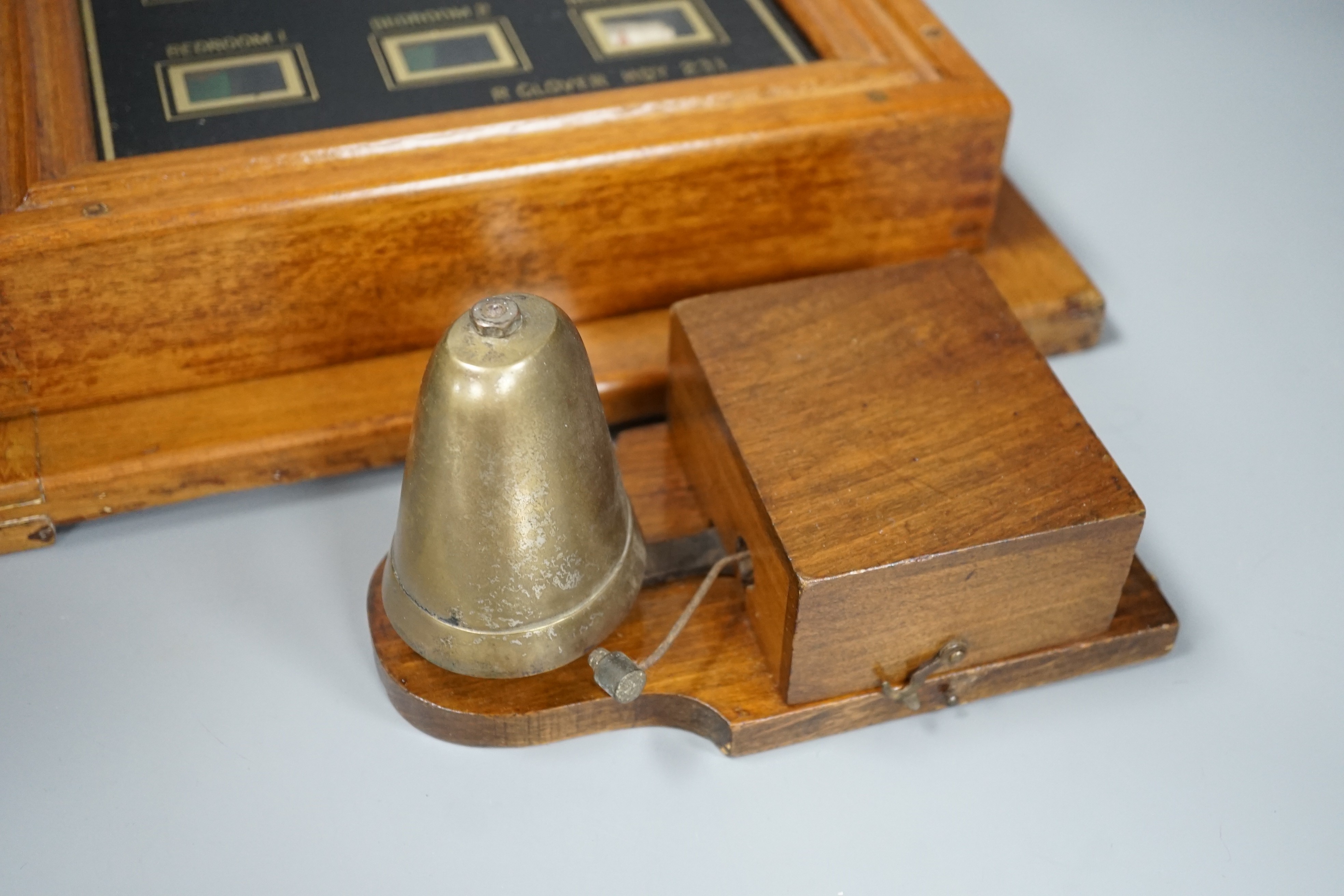 An oak servant call box and bell, 29x35cm